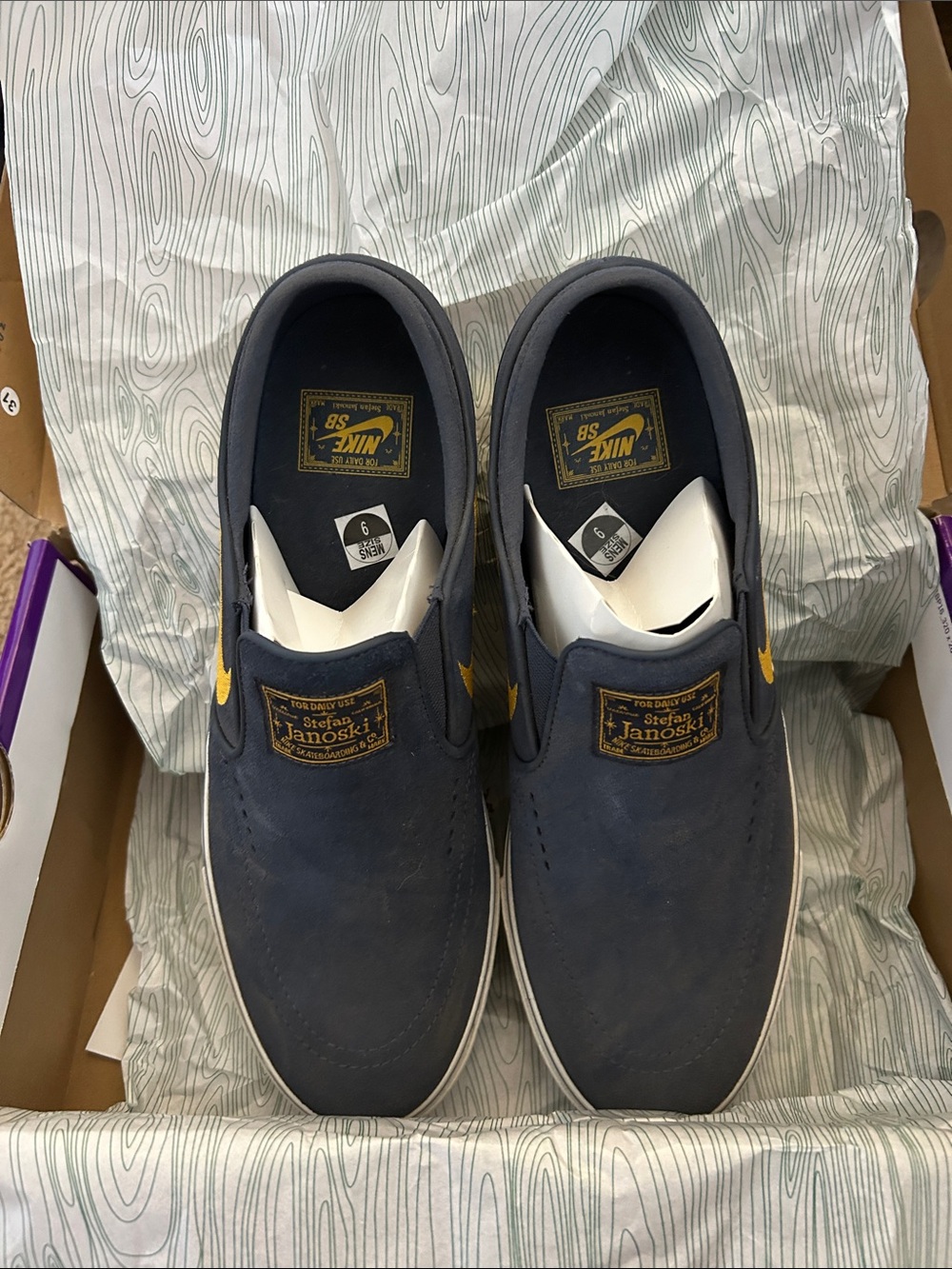 Nike Stefan Janoski Slip-On Loafers in Navy with Gold Accent